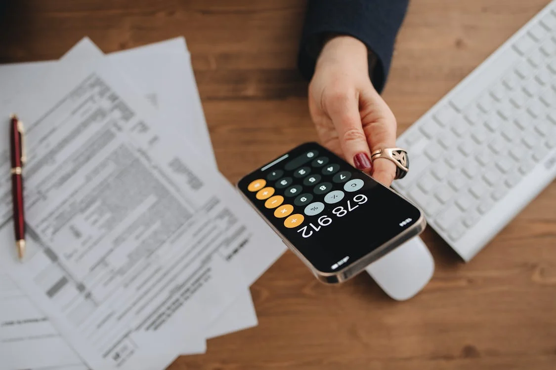 calculator being held in hand